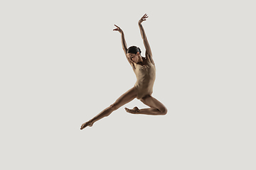 Image showing Modern ballet dancer. Contemporary art ballet. Young flexible athletic woman.