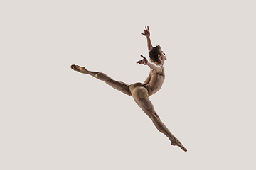 Image showing Modern ballet dancer. Contemporary art ballet. Young flexible athletic man.