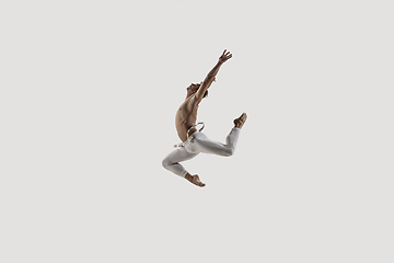 Image showing Modern ballet dancer. Contemporary art ballet. Young flexible athletic man.