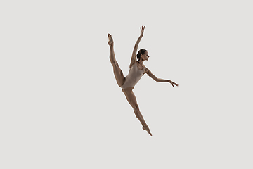 Image showing Modern ballet dancer. Contemporary art ballet. Young flexible athletic woman.