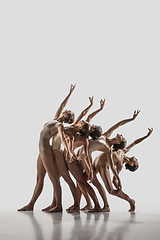 Image showing The group of modern ballet dancers. Contemporary art ballet. Young flexible athletic men and women.