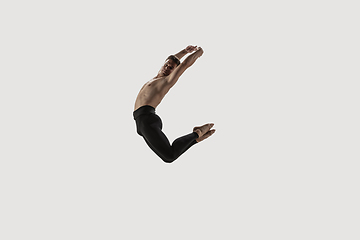 Image showing Modern ballet dancer. Contemporary art ballet. Young flexible athletic man.