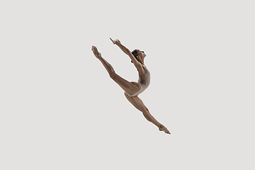 Image showing Modern ballet dancer. Contemporary art ballet. Young flexible athletic woman.