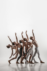 Image showing The group of modern ballet dancers. Contemporary art ballet. Young flexible athletic men and women.