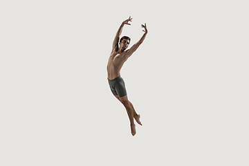 Image showing Modern ballet dancer. Contemporary art ballet. Young flexible athletic man.