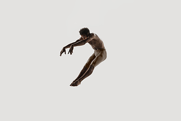 Image showing Modern ballet dancer. Contemporary art ballet. Young flexible athletic man.