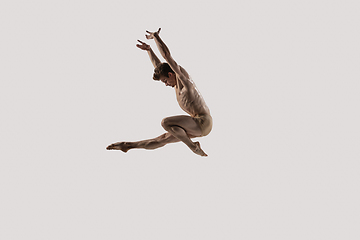 Image showing Modern ballet dancer. Contemporary art ballet. Young flexible athletic man.