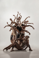 Image showing The group of modern ballet dancers. Contemporary art ballet. Young flexible athletic men and women.