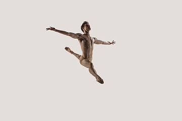 Image showing Modern ballet dancer. Contemporary art ballet. Young flexible athletic man.