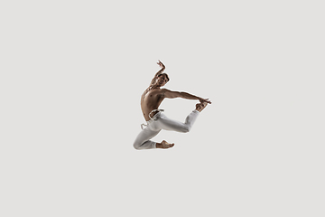 Image showing Modern ballet dancer. Contemporary art ballet. Young flexible athletic man.