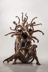 Image showing The group of modern ballet dancers. Contemporary art ballet. Young flexible athletic men and women.