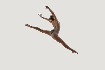 Image showing Modern ballet dancer. Contemporary art ballet. Young flexible athletic woman.