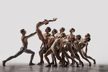 Image showing The group of modern ballet dancers. Contemporary art ballet. Young flexible athletic men and women.