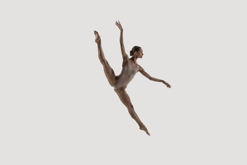 Image showing Modern ballet dancer. Contemporary art ballet. Young flexible athletic woman.