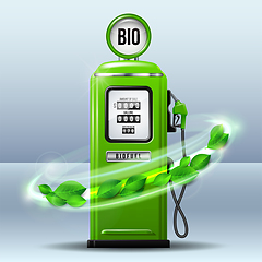 Image showing Whirlwind of green leaves swirls around Green bright Gas station pump with fuel nozzle of petrol pump.