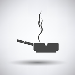 Image showing Cigarette in an ashtray icon