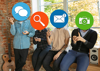 Image showing Creative millenial people connecting and sharing social media. Modern UI icons as heads