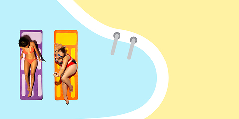 Image showing Top view of young caucasian model\'s resting on beach resort