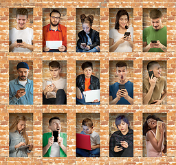 Image showing Group of happy young people sharing in social media