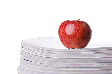 Image showing Apple over a stack of books