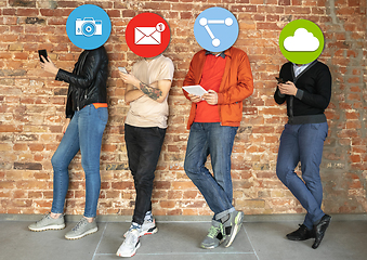 Image showing Creative millenial people connecting and sharing social media. Modern UI icons as heads