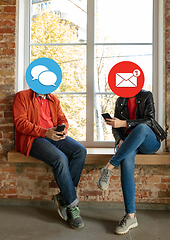 Image showing Creative millenial people connecting and sharing social media. Modern UI icons as heads