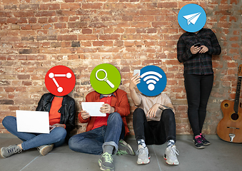 Image showing Creative millenial people connecting and sharing social media. Modern UI icons as heads