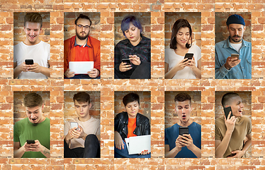 Image showing Group of happy young people sharing in social media