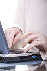 Image showing Typing on a laptop