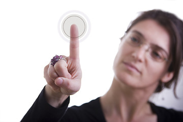 Image showing businesswoman pressing a button