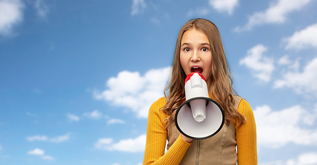 Image showing teenage girl speaking to megaphone