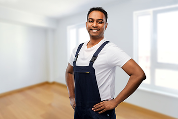 Image showing happy smiling indian worker or builder