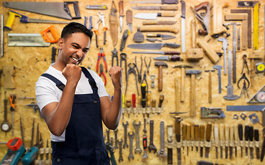 Image showing happy indian worker or builder celebrating success