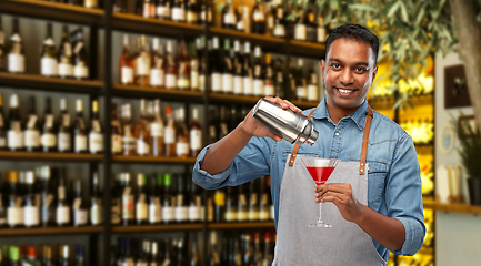 Image showing indian barman with glass of cocktail and shaker