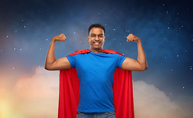 Image showing indian man in superhero cape showing his power