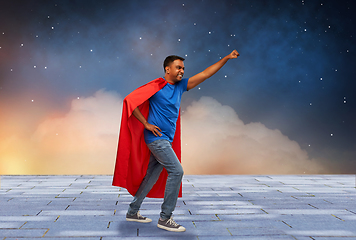 Image showing indian man in superhero cape makes winning gesture