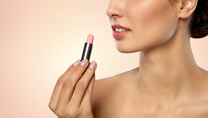 Image showing beautiful smiling young woman with pink lipstick