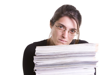 Image showing Woman with a pile of books