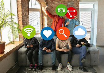 Image showing Creative millenial people connecting and sharing social media. Modern UI icons as heads