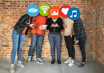 Image showing Creative millenial people connecting and sharing social media. Modern UI icons as heads