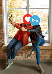 Image showing Creative millenial people connecting and sharing social media. Modern UI icons as heads