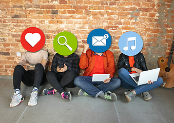 Image showing Creative millenial people connecting and sharing social media. Modern UI icons as heads