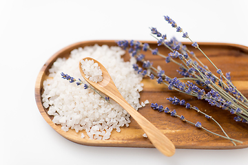 Image showing sea salt heap, lavender and spoon on wooden tray