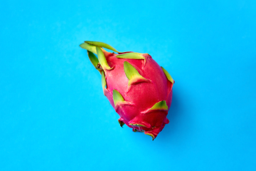 Image showing ripe dragon fruit or pitaya on blue background