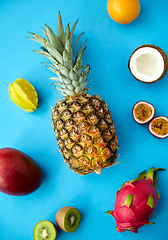 Image showing pineapple with other fruits on blue background