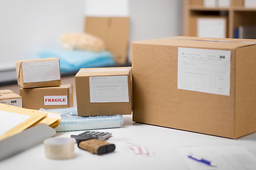 Image showing parcel boxes and packing stuff at post office