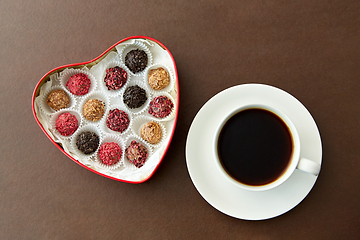 Image showing candies in heart shaped chocolate box and coffee