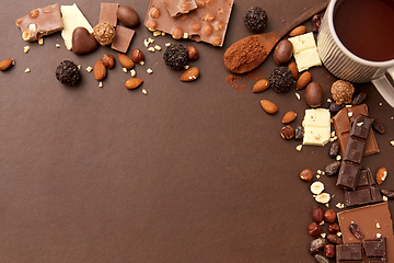 Image showing hot chocolate with nuts, cocoa powder and candies