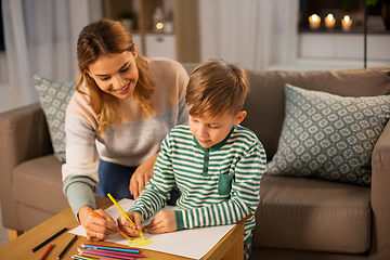 Image showing mother and son with pencils drawing at home