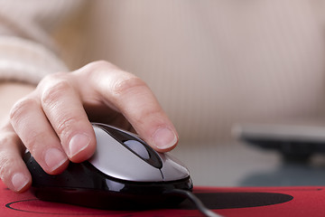 Image showing Woman hand on a mouse